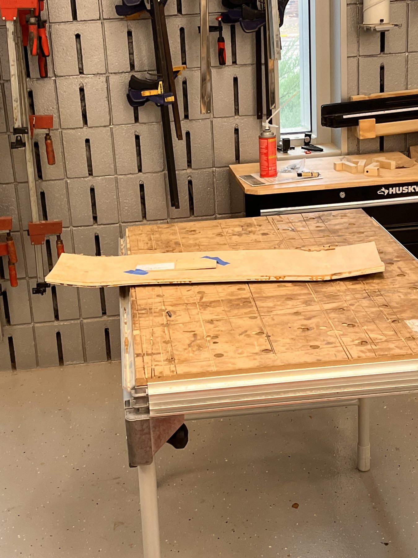 Shaping the plywood deck in the woodshop