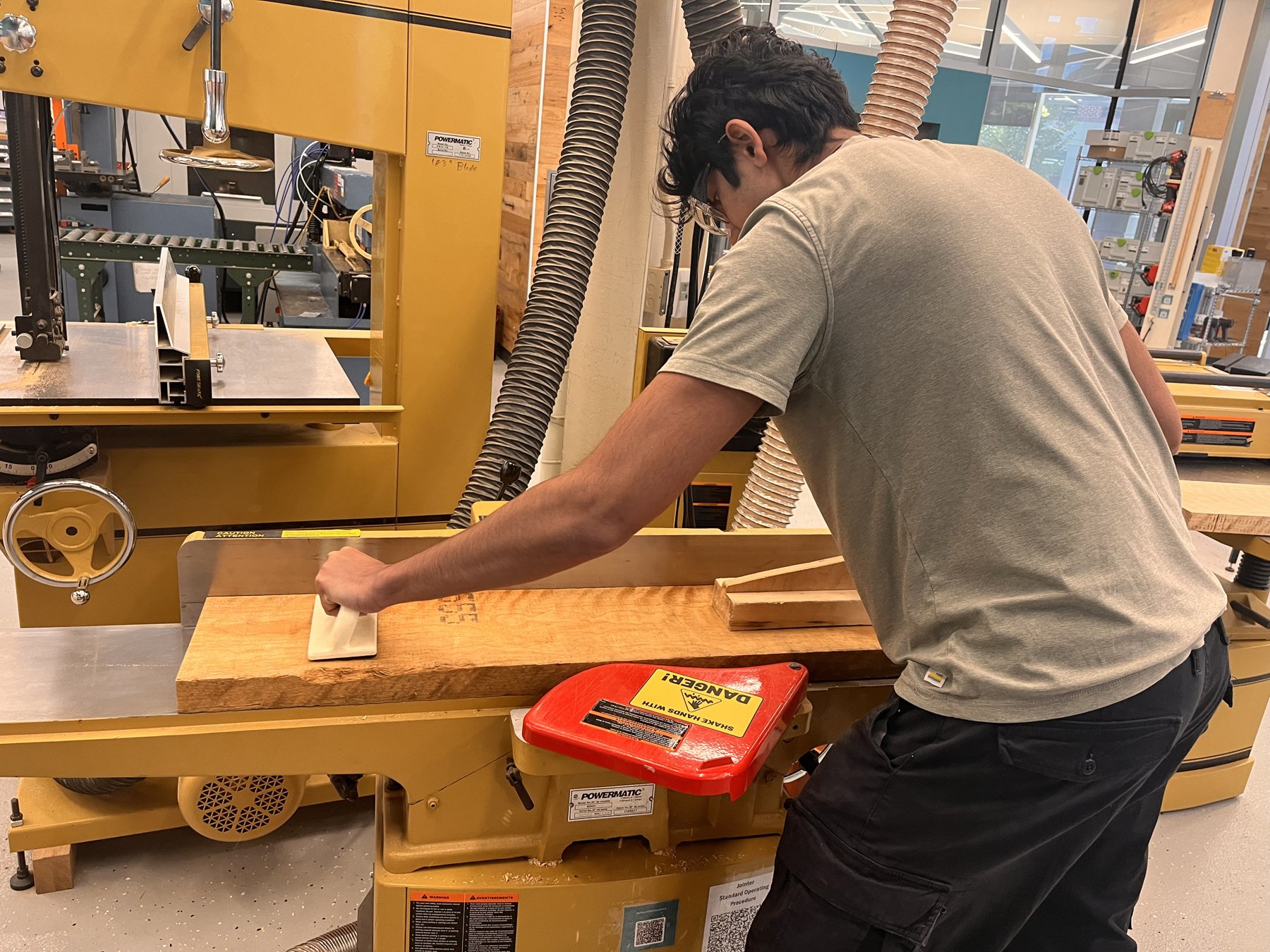 Working with timber at the woodshop bench