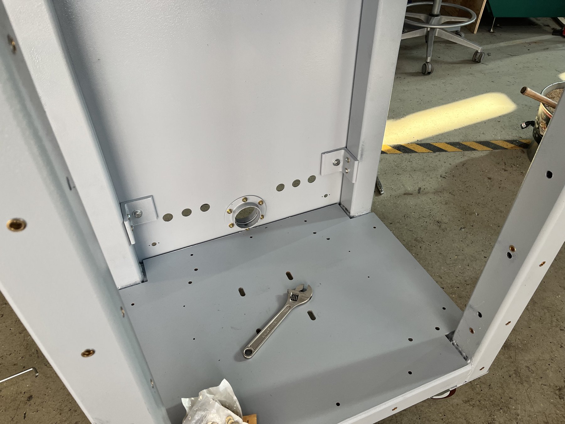 Enclosure base and panel mounting details
